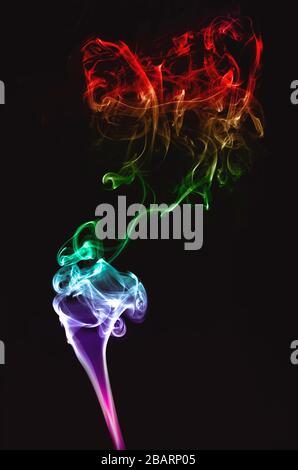 Abstract color smoke on black background.