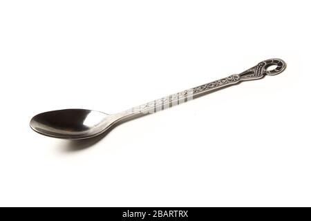 Metal teaspoon isolated on white background Stock Photo