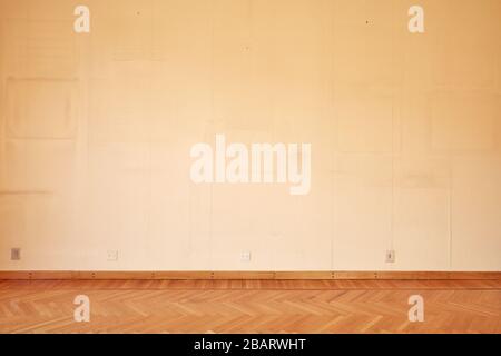 Old, empty apartment interior with parquet wooden floor Stock Photo