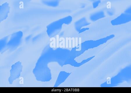 Abstract light blue background with dark blue spots Stock Photo