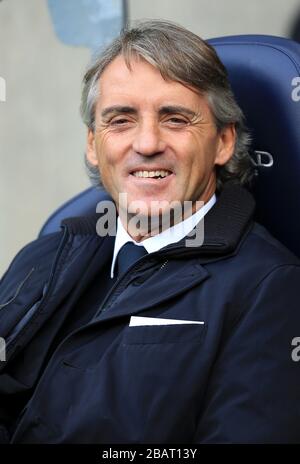 Manchester City manager Roberto Mancini on the touchline Stock Photo Alamy