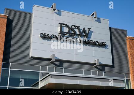 A logo sign outside of a Designer Shoe Warehouse (DSW) retail store location in North Wales, Pennsylvania, on March 23, 2020. Stock Photo