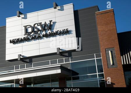 A logo sign outside of a Designer Shoe Warehouse (DSW) retail store location in North Wales, Pennsylvania, on March 23, 2020. Stock Photo