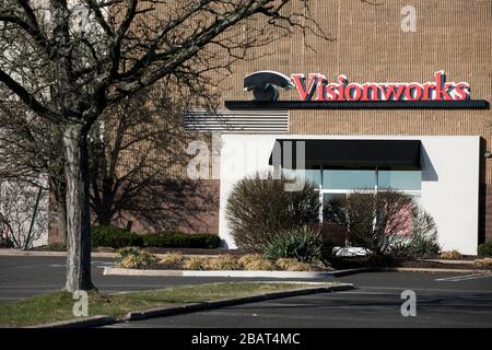 A logo sign outside of a Visionworks retail store location in North A logo sign outside of a Visionworks retail store location in North