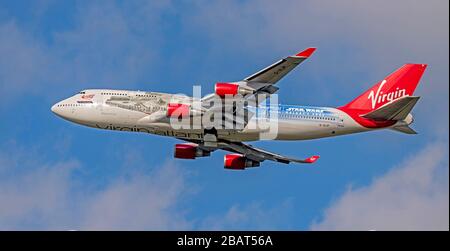 Virgin Atlantic Boeing 747, 'The Falcon' G-VLIP, departing from  Manchester Airport Stock Photo