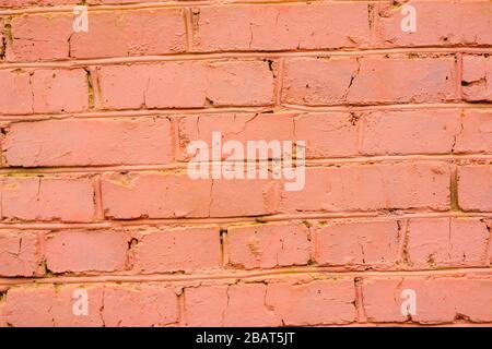 old red brick wall, masonry close-up texture, brick painted orange Stock Photo