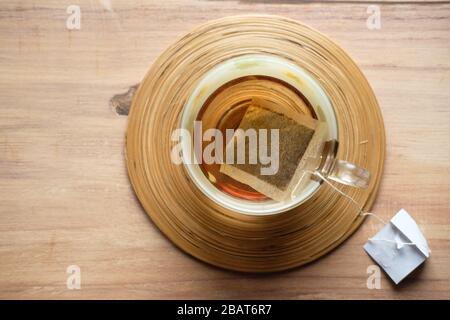 top view of green tea and tea bag on table  Stock Photo