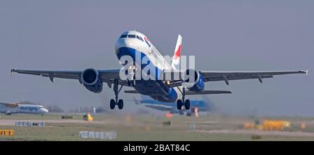 British Airways, Airbus A319,  G-EUPA, departing from  Manchester Airport Stock Photo