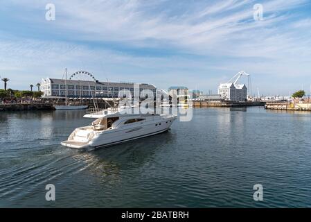 Cape Town, South Africa, Dec 2019. Luxury yacht leaving marina on the Cape Town waterfront area. South Africa. Stock Photo