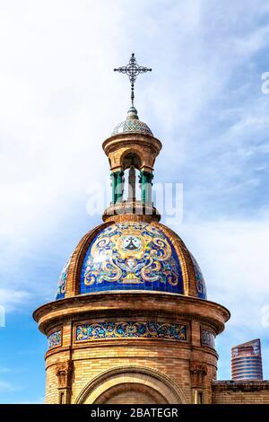 Domed roof covered with decorative azulejo tiles, Moorish Revival Chapel of El Carmen next to the Triana bridge, Seville, Andalusia Stock Photo