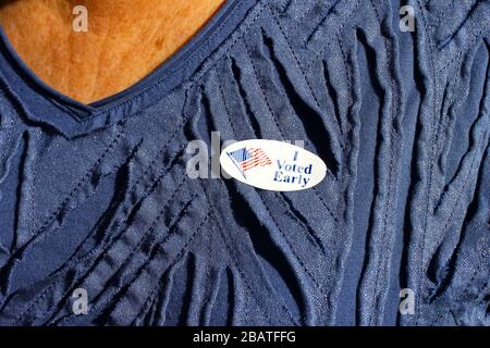 I Voted Early sticker on a womans shirt after voting in Salt Lake City, Utah, USA Stock Photo