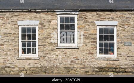 Building with three sash Georgian style windows in Felindre Farchog, near Newport. Pembrokeshire, Wales. UK Stock Photo