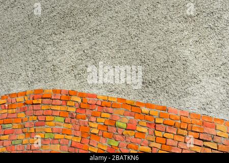 Mosaic stones on wall building. Multicolored abstract background for your design with copy space and place for text. Stock Photo