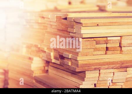 Workman at the sawmill. Young hardworking man Stock Photo