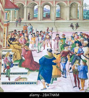 SIENA, ITALY - JULY 10, 2017: Fresco in Piccolomini Library in Siena Cathedral, by Pinturicchio, depicting Enea ilvio Piccolomini crowned court poet b Stock Photo