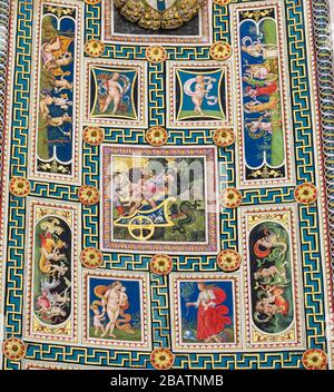SIENA, ITALY - JULY 10, 2017: Frescoes (1502) on the ceiling of Piccolomini Library in Siena Cathedral, Tuscany, Italy, by Pinturicchio Stock Photo