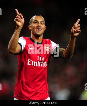 Arsenal's Theo Walcott celebrates scoring his side's fourth goal of the game Stock Photo