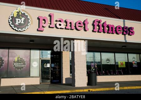 A logo sign outside of a Planet Fitness location in Abingdon, Maryland on March 26, 2020. Stock Photo