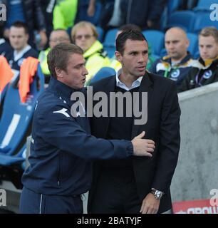 Birmingham City manager Lee Clark greets Brighton & Hove Albion manager Gus Poyet (right) prior to kick off Stock Photo