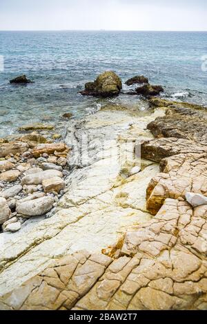 Spain's rocky coast on the Mediterranean in vintage version. Stock Photo