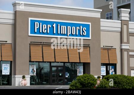 A logo sign outside of a Pier 1 Imports retail store location in Cockeysville, Maryland on March 26, 2020. Stock Photo