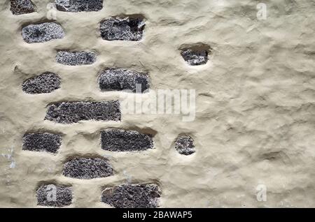 Old wall with porous stones, abstract background. Stock Photo