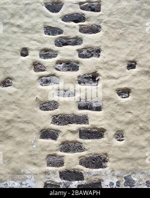 Old wall with porous stones, abstract background. Stock Photo