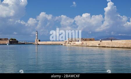 View of Chania lighthouse at the port, second largest city of Crete island, Greece. Stock Photo