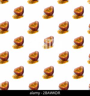 Colorful fruit pattern of exotic passion fruit fruits on a white background. Top view Stock Photo