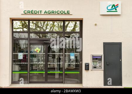 SAN RAPHAEL, FRANCE - APRIL 2019: Signs on the outside of a branch of the Credit Agricole bank in San Raphael on the French Riviera Stock Photo