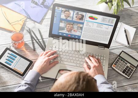 Virtual talking with friends, colleague and using video chat conference. Remote learning or work. Home quarantine or prevention of coronavirus infecti Stock Photo