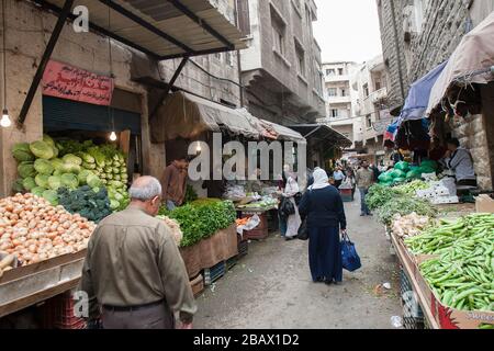 Amman, Jordan, May 3, 2009: People shop in a street market in dowtown Amman, Jordan. Stock Photo