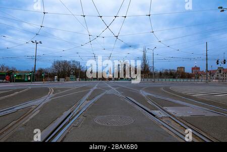 Electric traction and tram tracks, rails. Poznan cityscape, empty city because of coronavirus covid-19 disease. Stock Photo