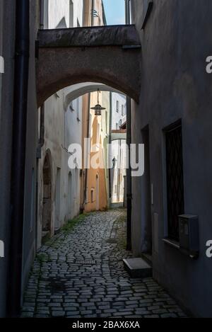Narrow little alley in the center of Passau, Bavaria, Germany Stock Photo