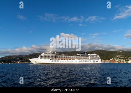 Cruise ship MSC Poesia departing the port of Bergen, Norway. Stock Photo