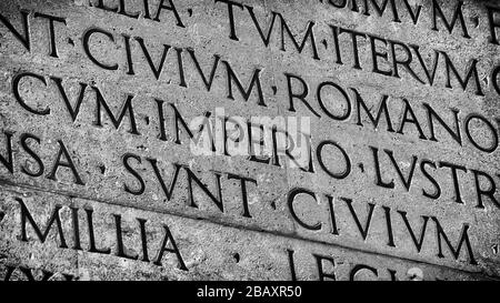Latin ancient language and classical education. Inscription from Emperor Augustus famous Res Gestae (1st century AD), with the word Imperio Stock Photo