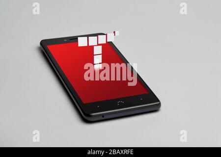 Illustrative Editorial image of a smartphone with the Tynker App logo Stock Photo