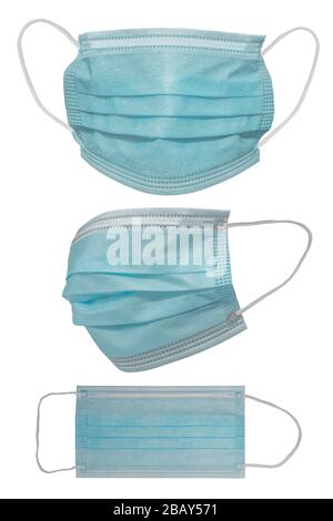 Surgical mask with rubber ear straps. Typical 3-ply surgical mask to cover the mouth and nose. Procedure mask from bacteria. Protection concept. Stock Photo