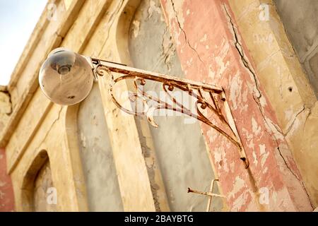 Old Wall Sconce on Building in Tel Aviv Stock Photo