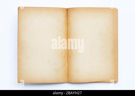 Opened old book isolated on white background. Stock Photo