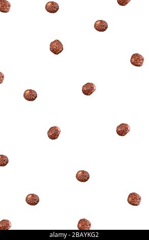 Close up chocolate rice balls for breakfast. Falling from top to bottom. Isolated on white background. Children's breakfast. Stock Photo