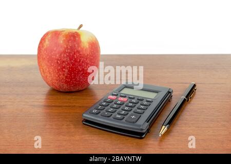 Apple calculator handle lie on the table. Stock Photo