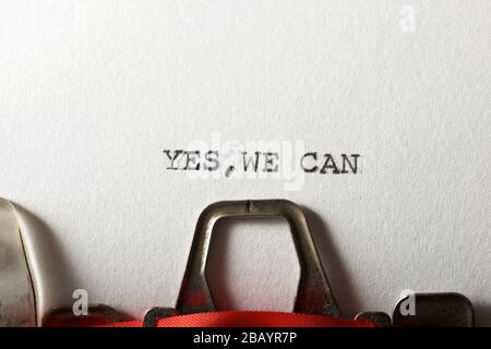 The sentence, Yes we can, written with a typewriter. Stock Photo