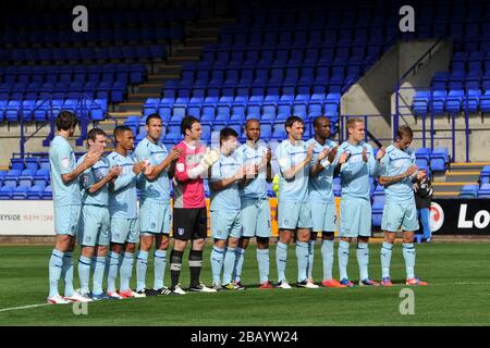 Coventry City fans observe a minute's applause before the game in honour of the victims of the Hillborough Disaster. Stock Photo