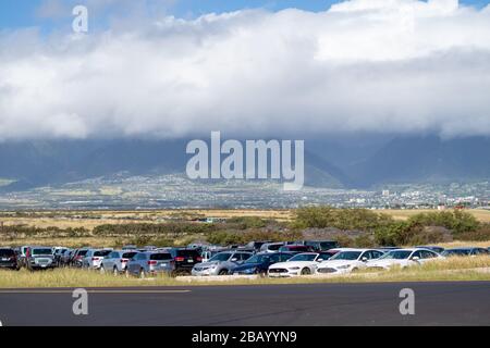 Fields of Unused Rental Cars in Maui, Hawaii during Covid-19 Pandemic. Without any tourists, the extra cars have nowhere to go. Stock Photo