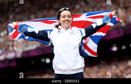 Great Britain's Stef Reid celebrates her silver medal in the Women's Long Jump T42/44 in the Olympic Stadium. Stock Photo