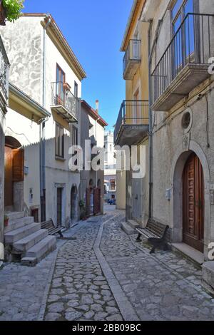 Castelvetere sul Calore, Italy. A narrow street between the old houses of a medieval village Stock Photo