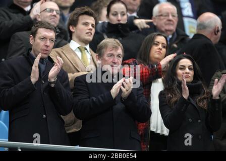 Former Liverpool manager Kenny Dalglish (centre) in the stands Stock Photo