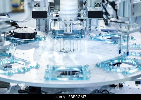 Automatic robot in assembly line working in factory. Smart factory industry 4.0 concept. Stock Photo