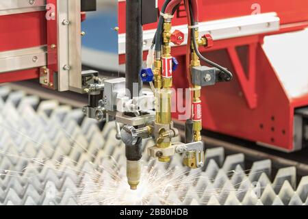 High precision CNC gas or plasma cutting metal sheet. Metal sheet and working plasma or gas plasma cutting machine. Stock Photo